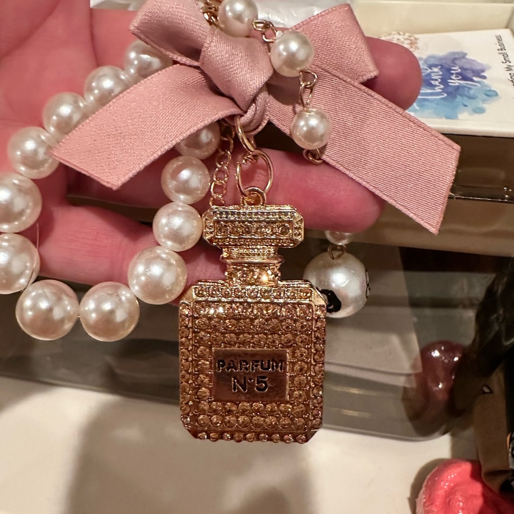 Gold Perfume Bottle Keychain with Black Bow - Picture 2 of 6